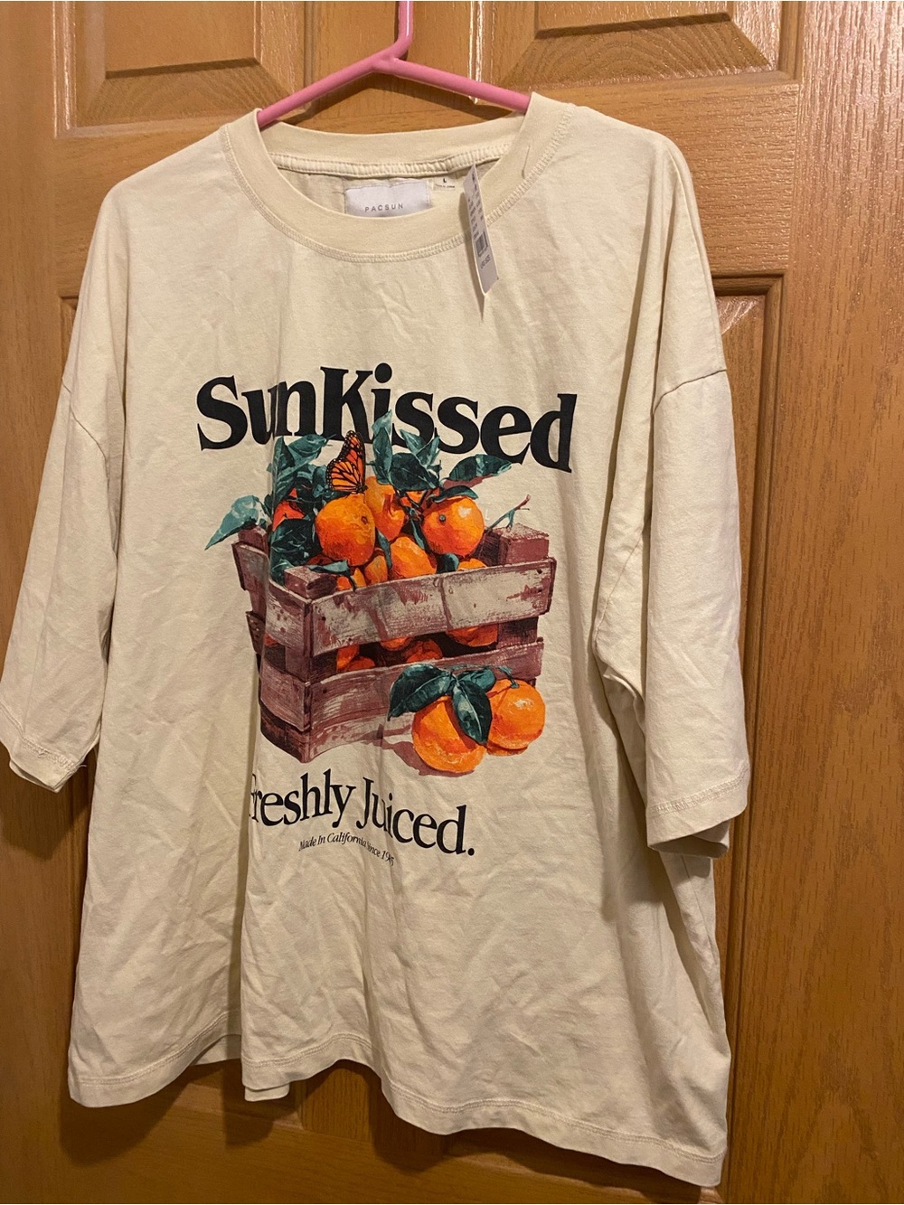 PacSun Cream Graphic Tee with Orange Fruit Crate